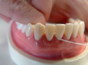uso de la seda o cinta dental 3